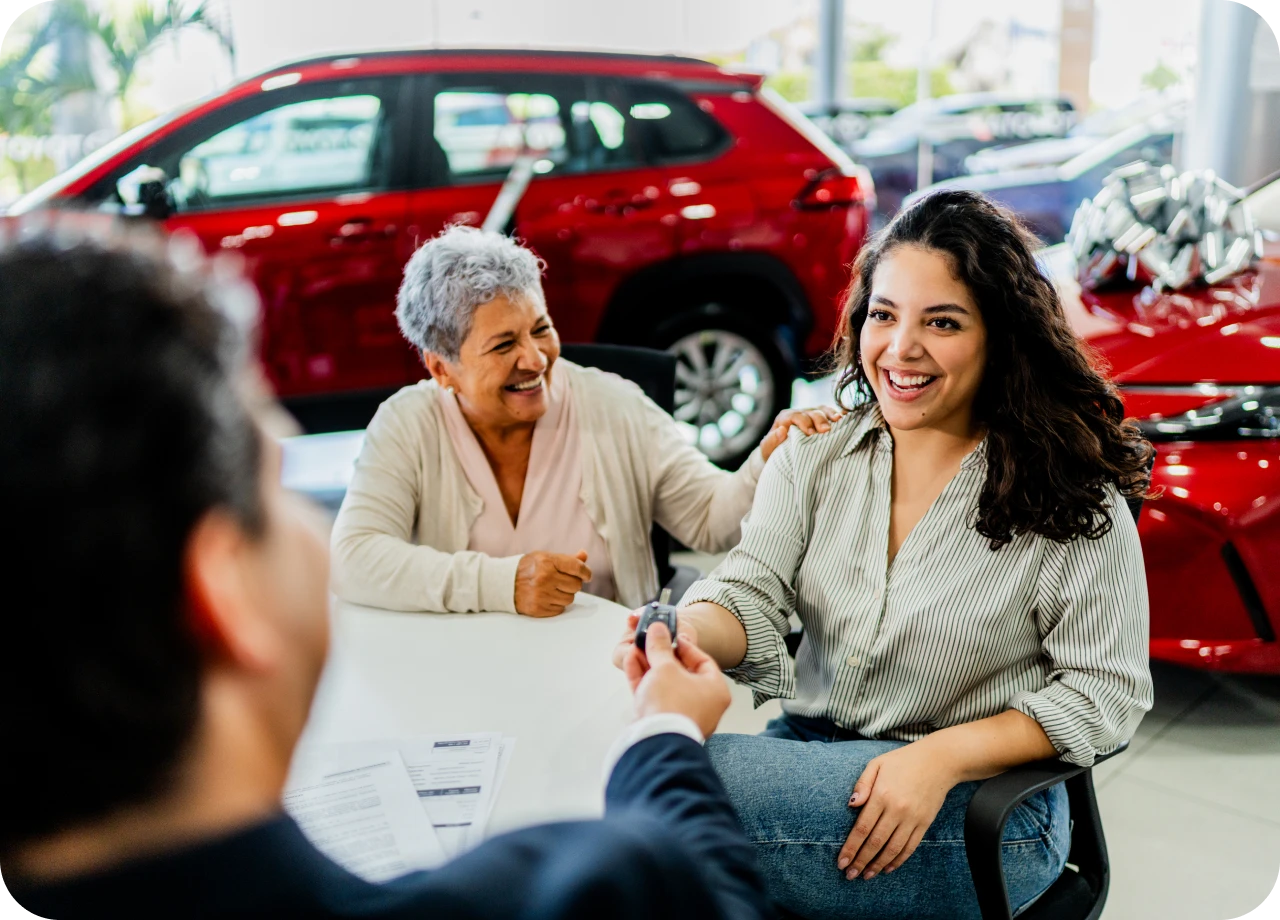 Happy customer in a car showroom