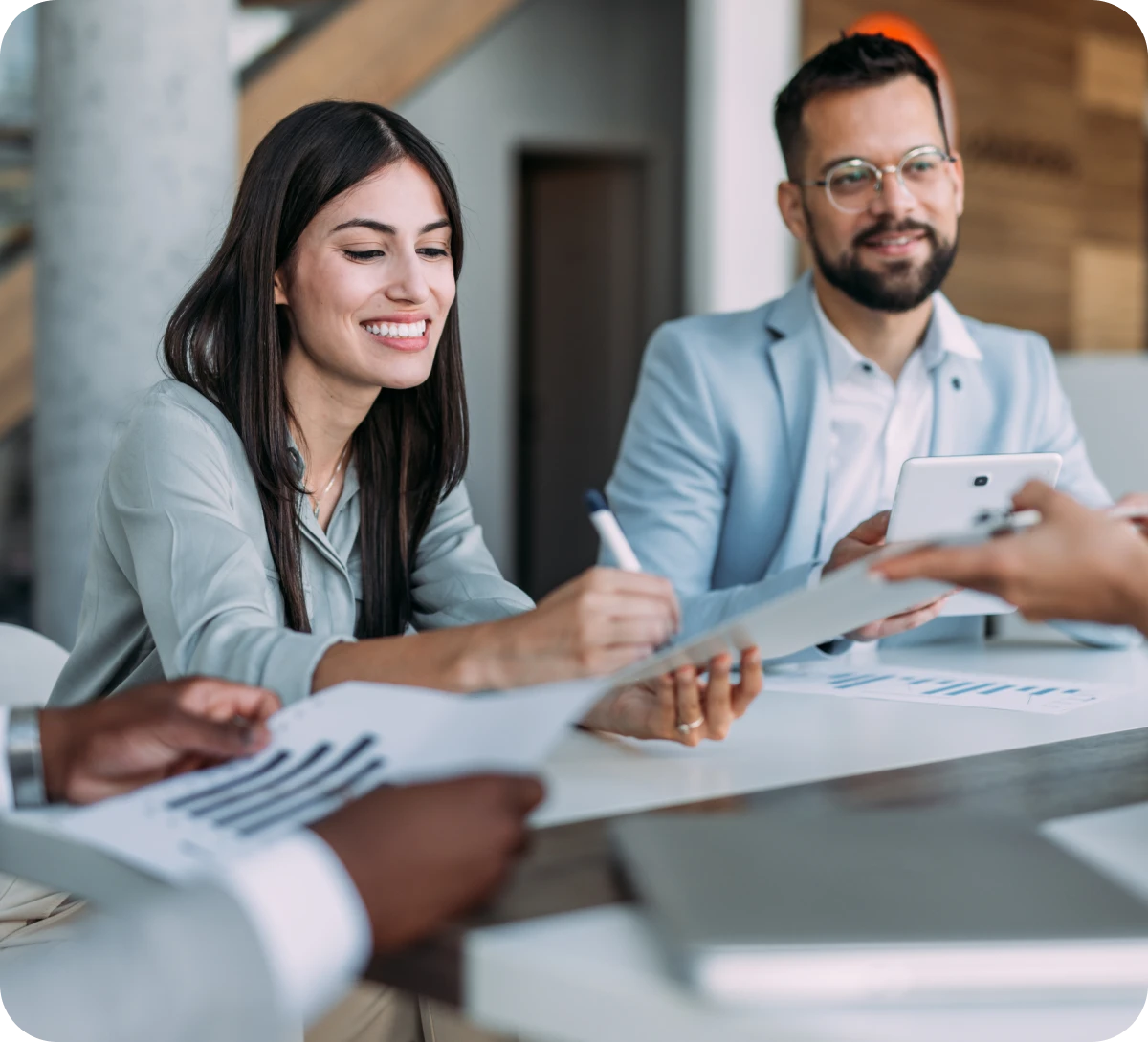 Professionals discussing in modern office