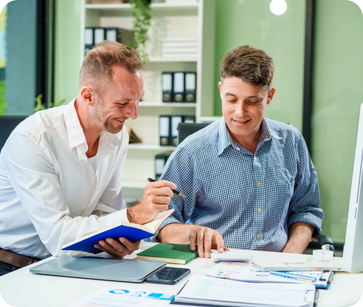 Professionals collaborating in modern office