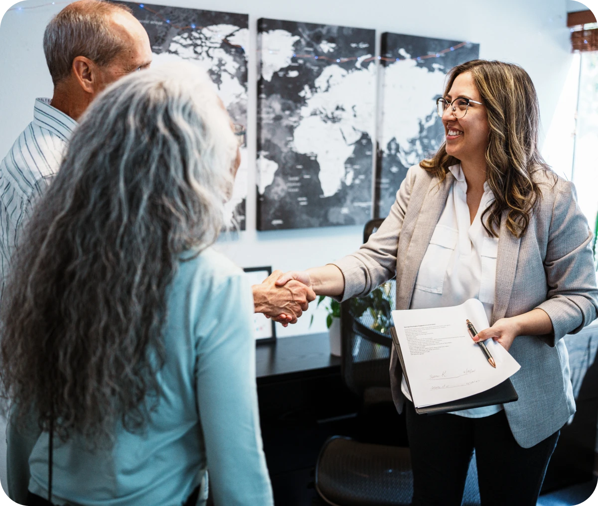 Friendly handshake during office discussion
